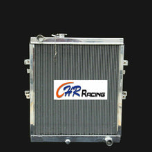 Load image into Gallery viewer, 4 rows aluminum radiator for Hilux KZN165 LN147 LN167 1KZ-TE 3.0L Engine TD